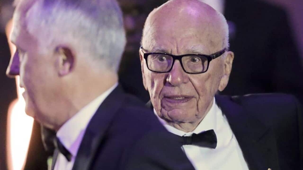Rupert Murdoch says the sale of his entertainment arm is no retreat.