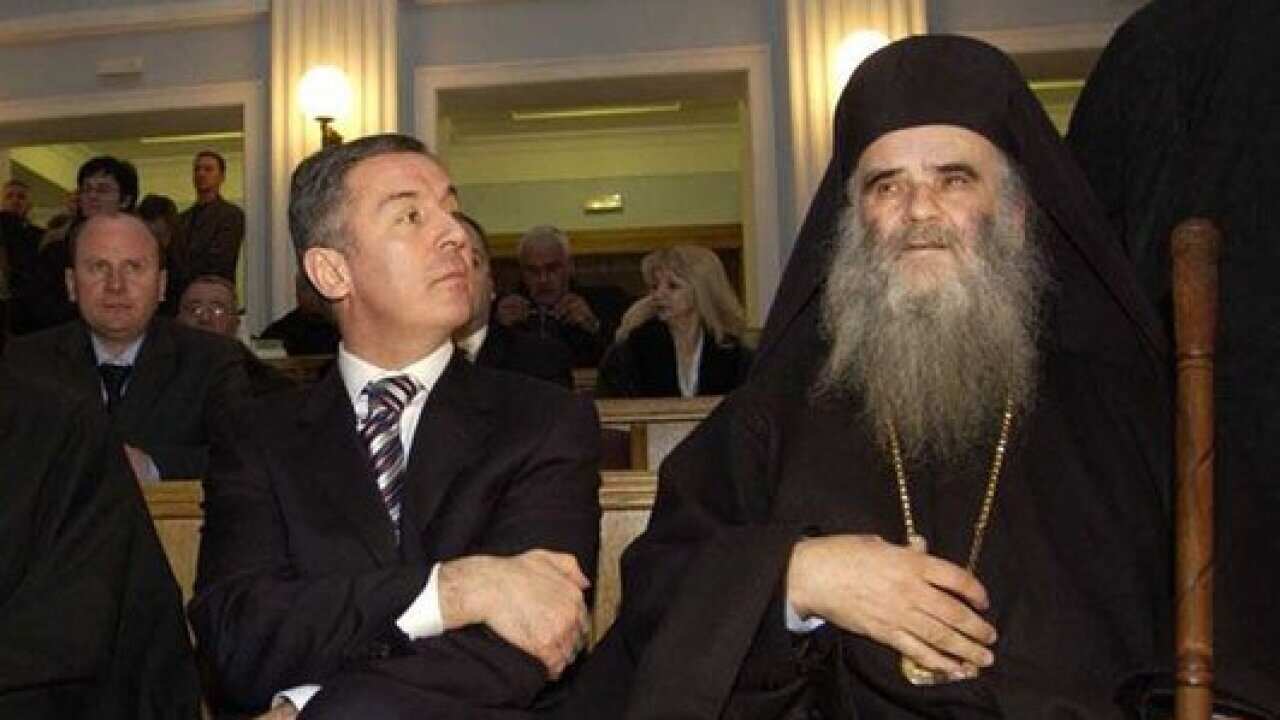 President of Montenegro Milo Djukanovic pictured with Amfilohije Crnogorski-primorski Radović