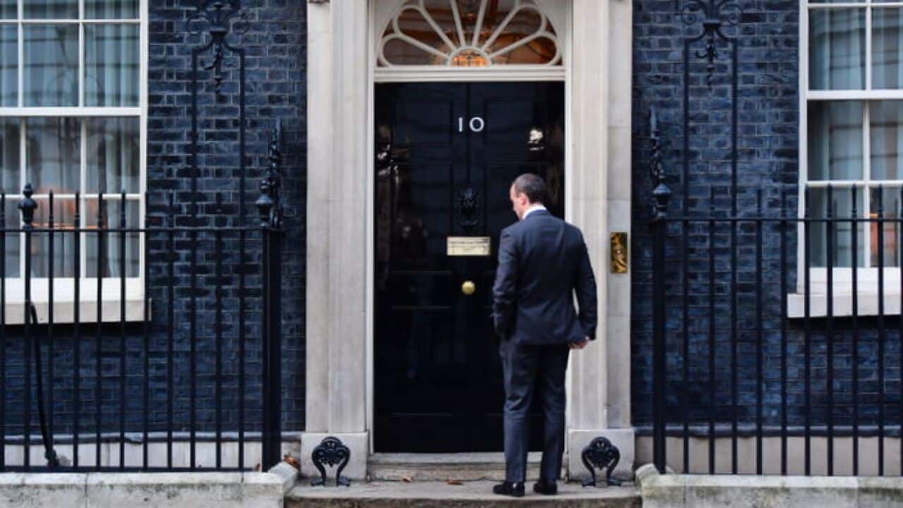 The UK Brexit Secretary Dominic Raab waits to gain entry into 10 Downing Street, London
