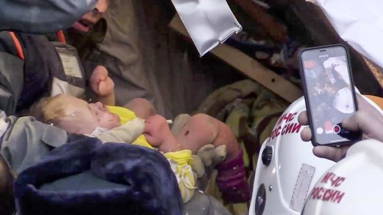 A 10-month-old baby boy has been pulled alive from the rubble of a collapsed Russian building.
