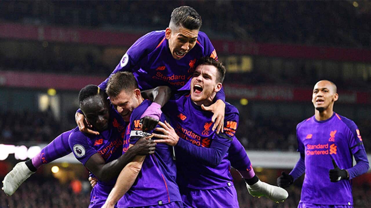Liverpool celebrates their goal against Arsenal