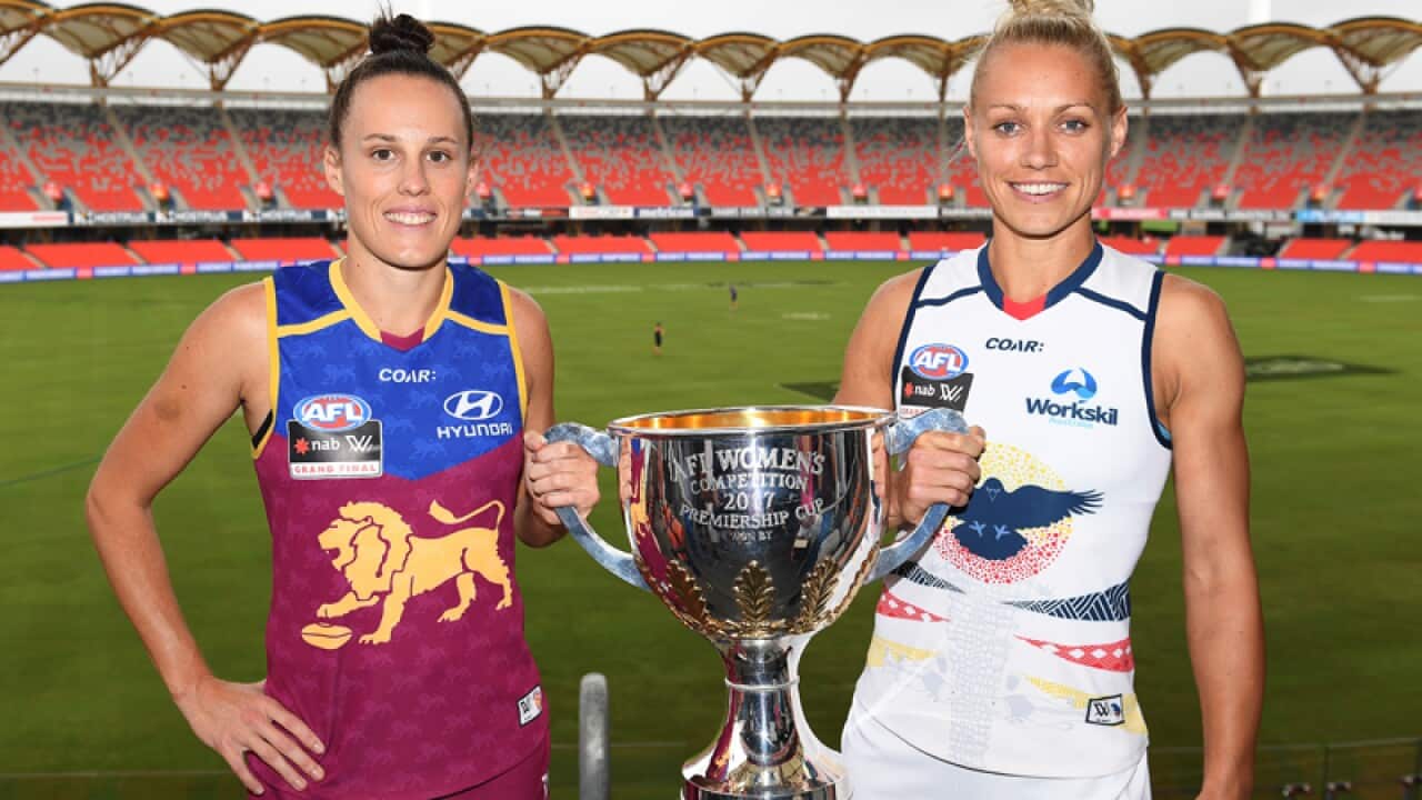 Lions captain Emma Zielke (L) and Crows captain Erin Phillips