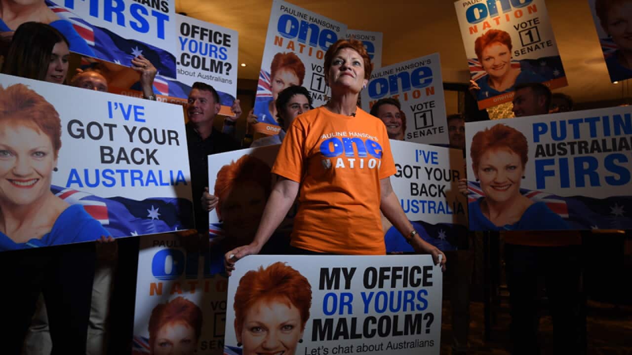 One Nation's Pauline Hanson looks on during a live television cross