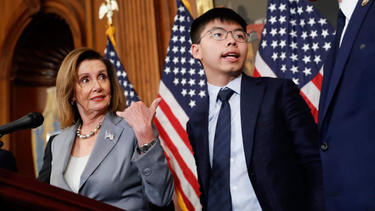 House Speaker Nancy Pelosi with Hong Kong activist Joshua Wong, right, during a news conference on Hong Kong Human Rights on Capitol Hill in Washington, Wednesday, Sept. 18, 2019. (AP Photo/Pablo Martinez Monsivais)