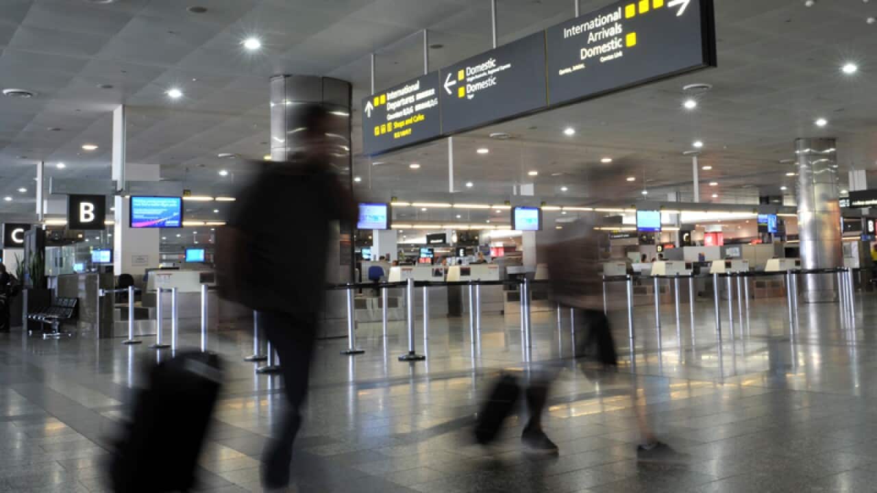 Travellers at Melbourne Airport