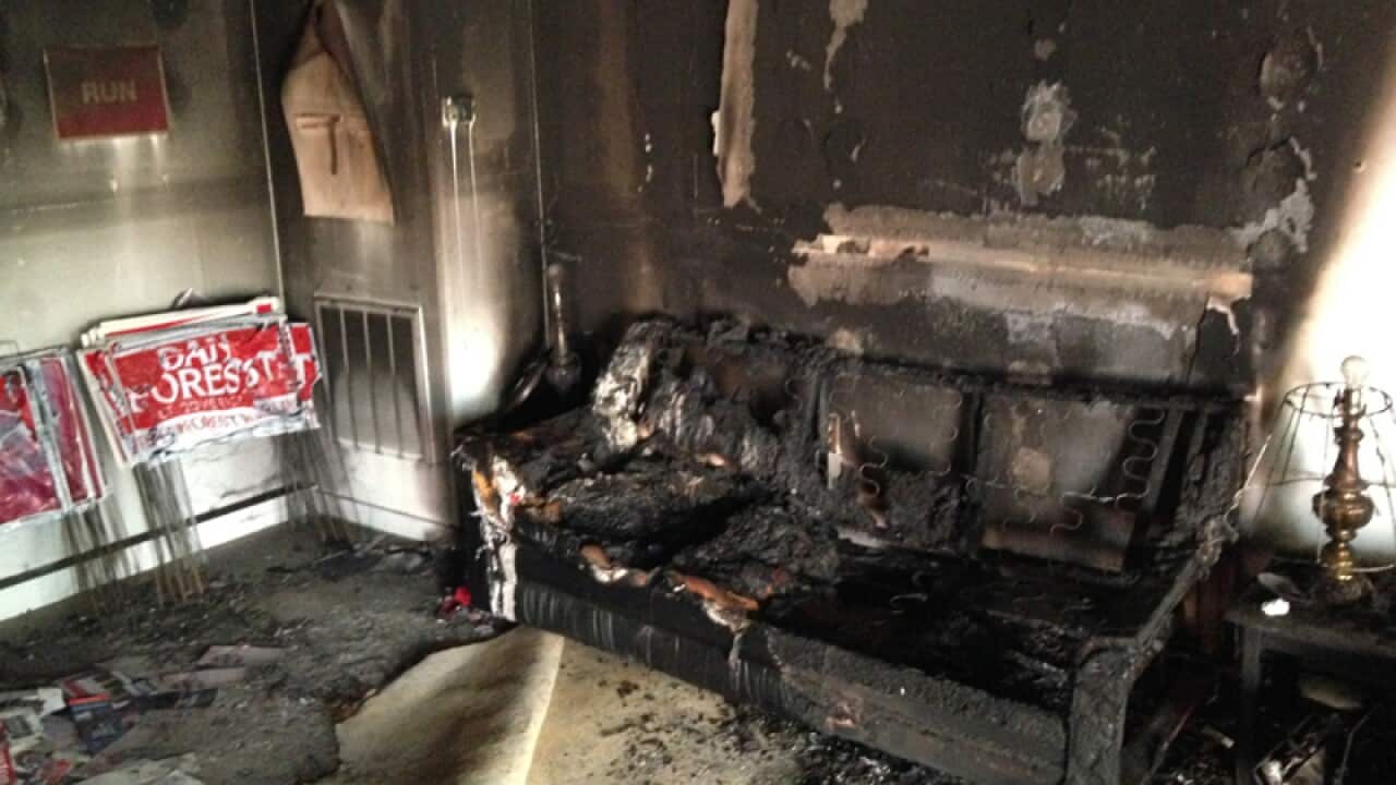 A burnt couch at the Orange County Republican headquarters