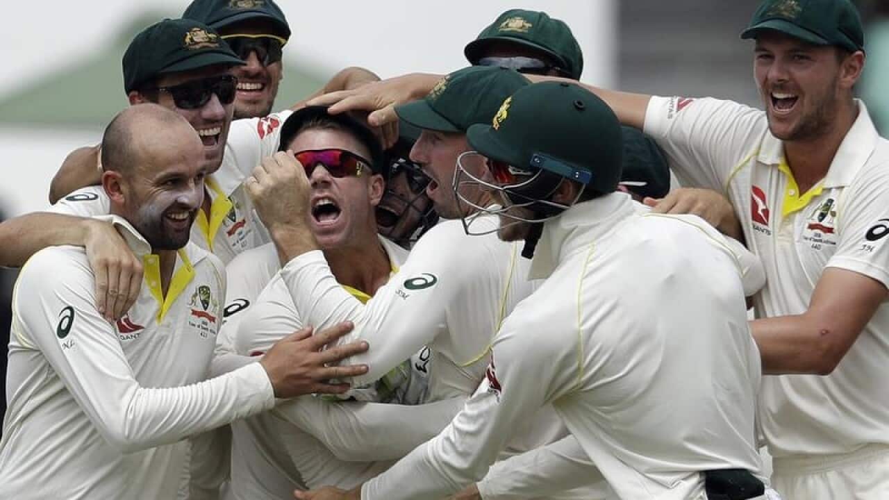Australia celebrate AB de Villiers' dismissal.