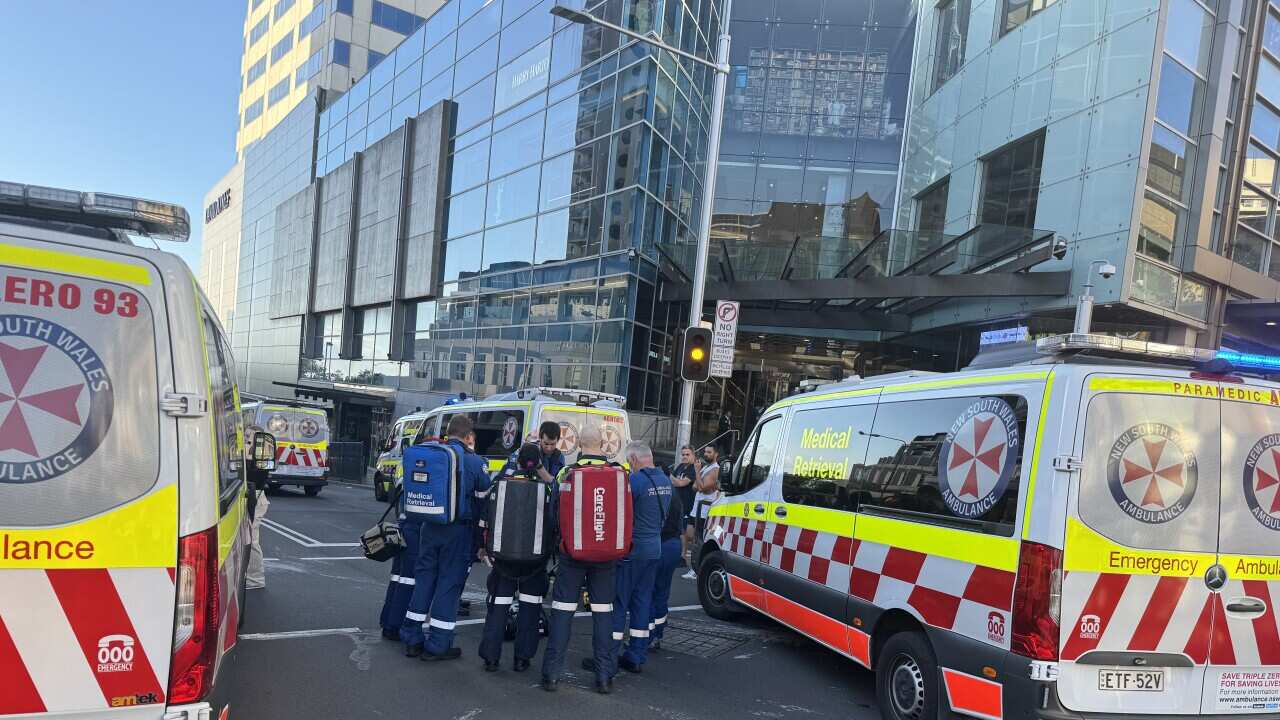 Emergency workers outside Westfields Bondi Junction after a critical incident with multiple casualties Photo Domenico Gentile SBS Italian .jpeg