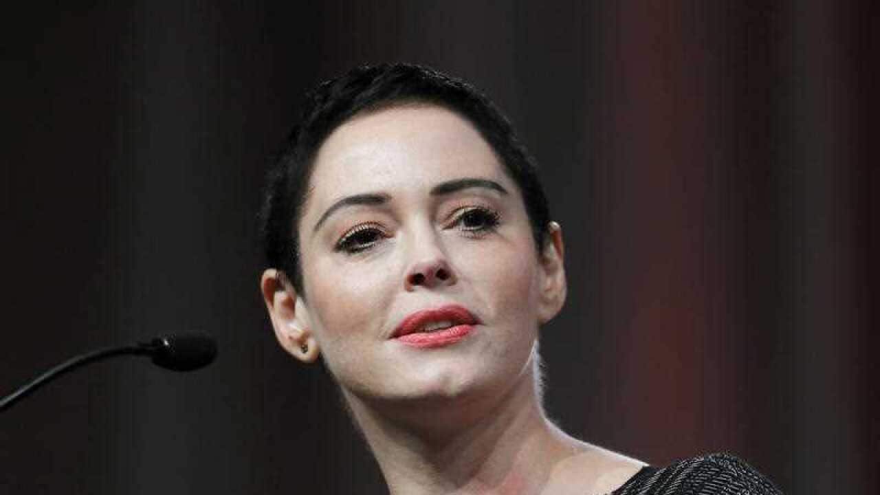 In this Oct. 27, 2017, file photo, actress Rose McGowan speaks at the inaugural Women's Convention in Detroit. An arrest warrant has been obtained for McGowan for felony possession of a controlled substance.