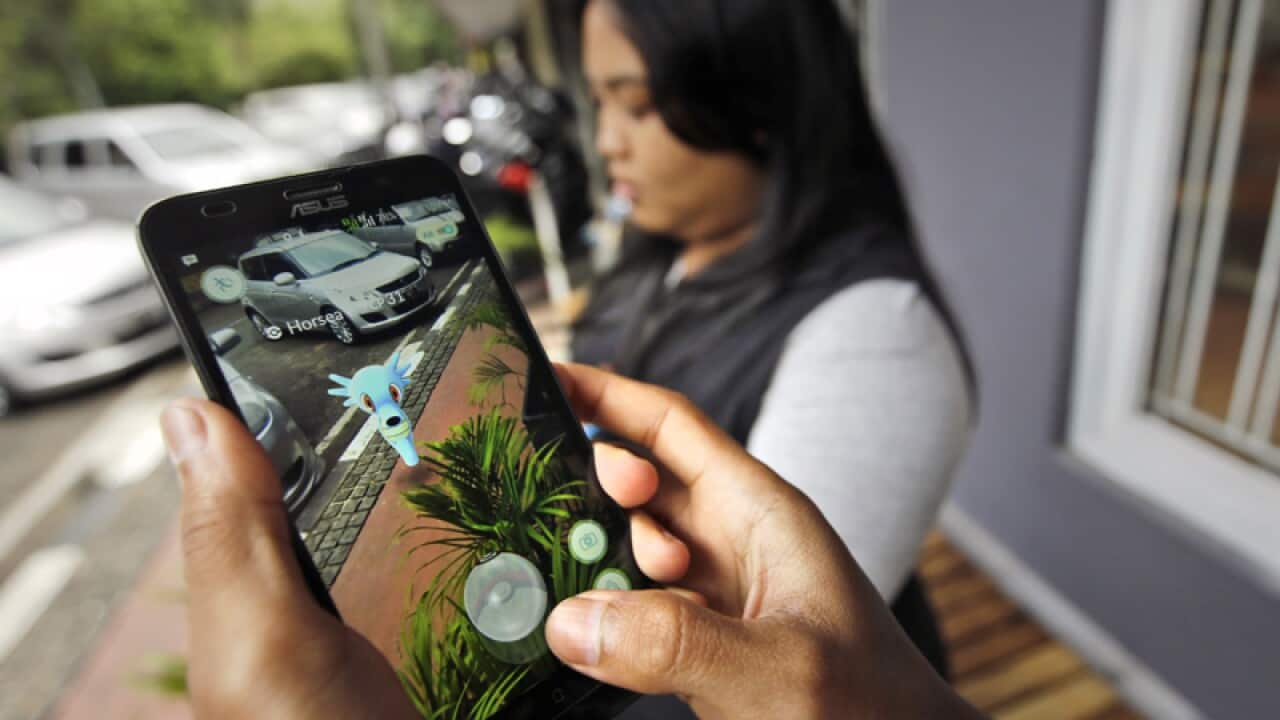 People play Pokemon Go in Jakarta