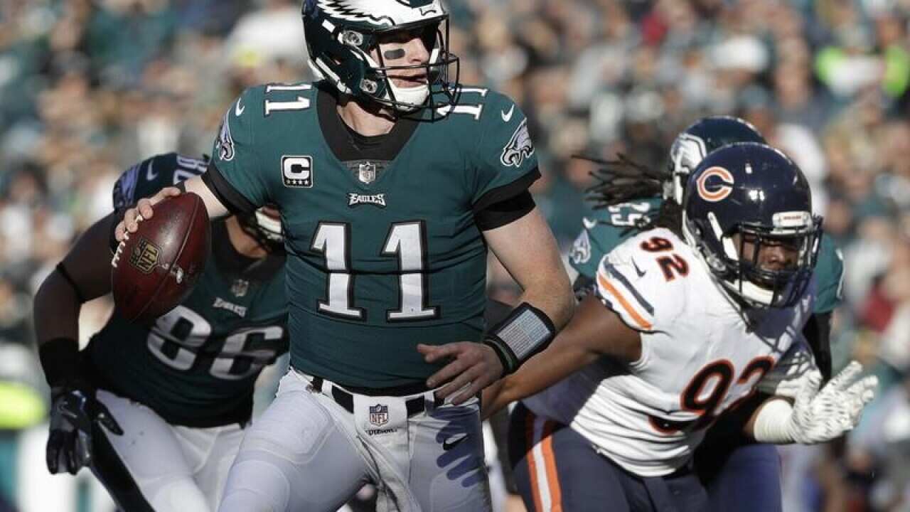 Carson Wentz looks to pass during game against Chicago Bears.