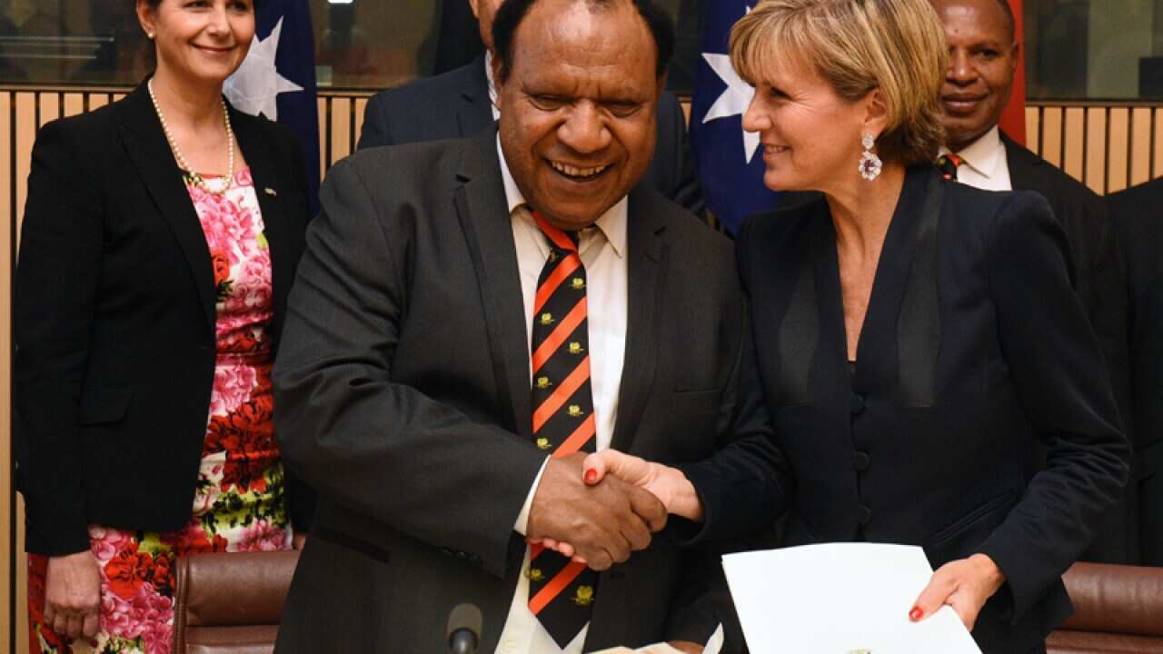 PNG Foreign Minister Rimbink Pato (L) and Julie Bishop