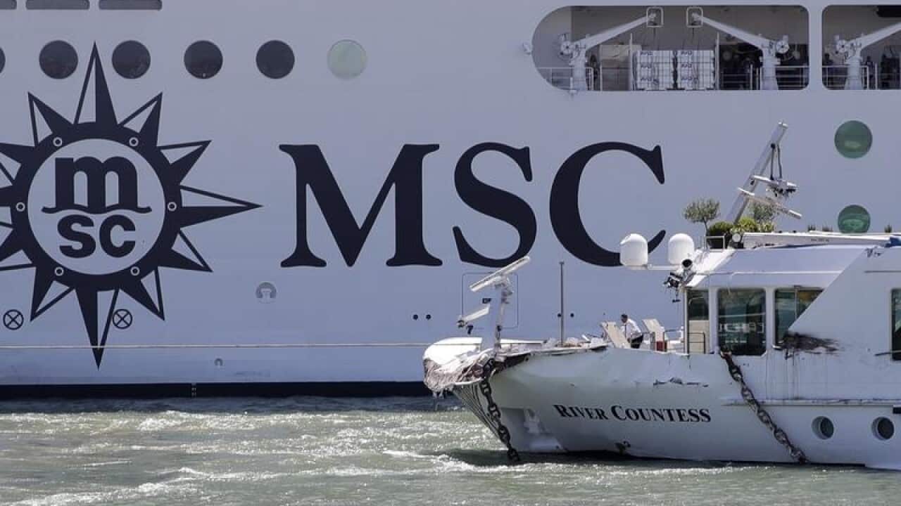 The Magnifica sails past after hitting the River Countess tour boat