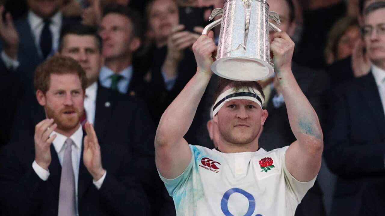 England's Dylan Hartley lifts the Calcutta Cup