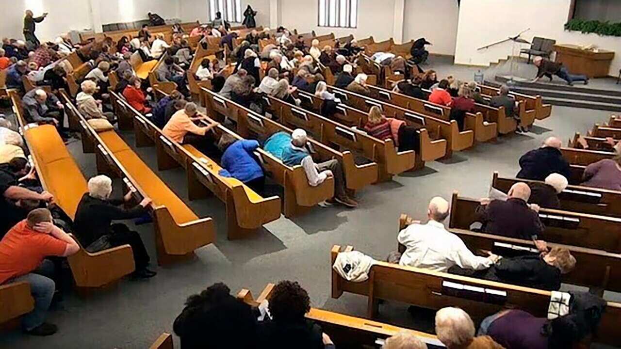 A still from the church's video live stream shows the shooting incident taking place