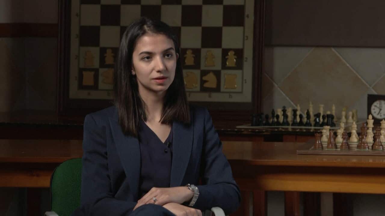 A woman giving an interview.