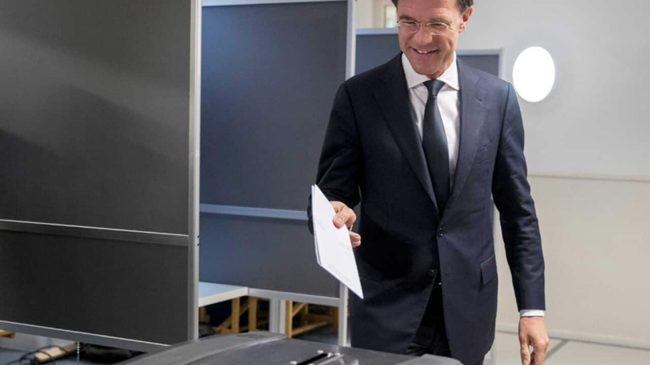 Dutch Prime Minister Mark Rutte casts his ballot