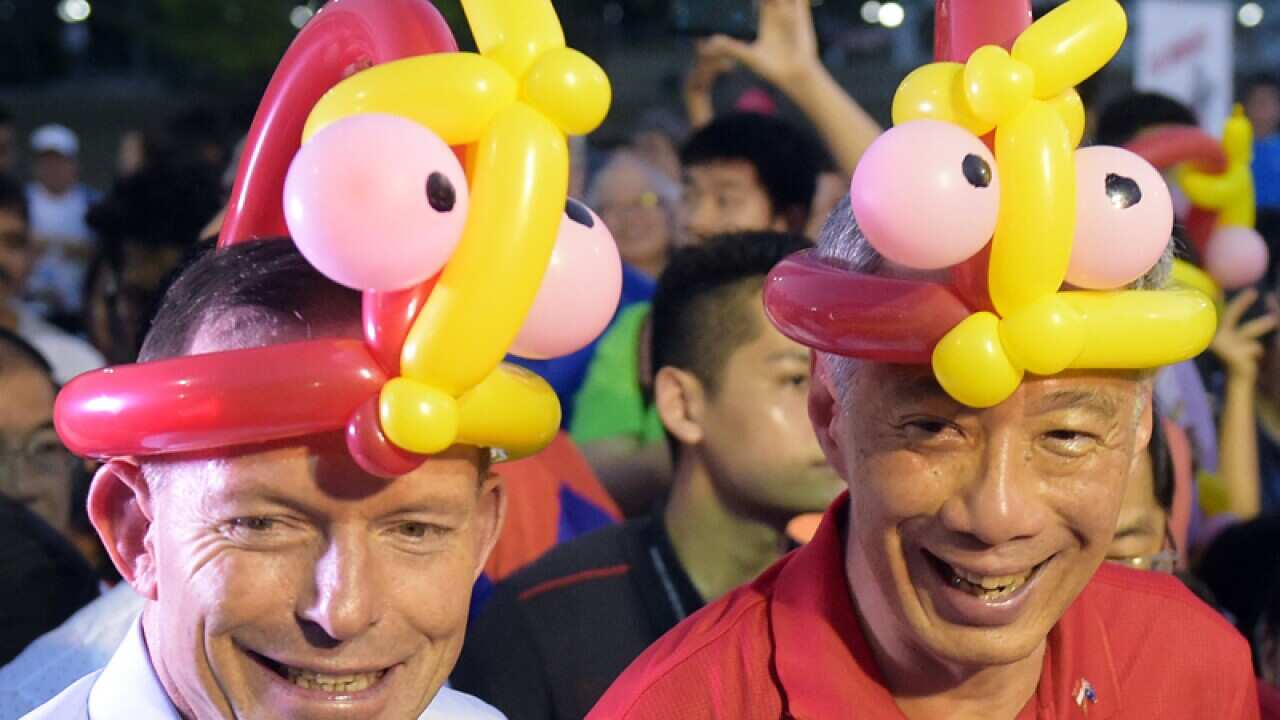 Tony Abbott, left, Singapore Prime Minister Lee Hsien Loong.