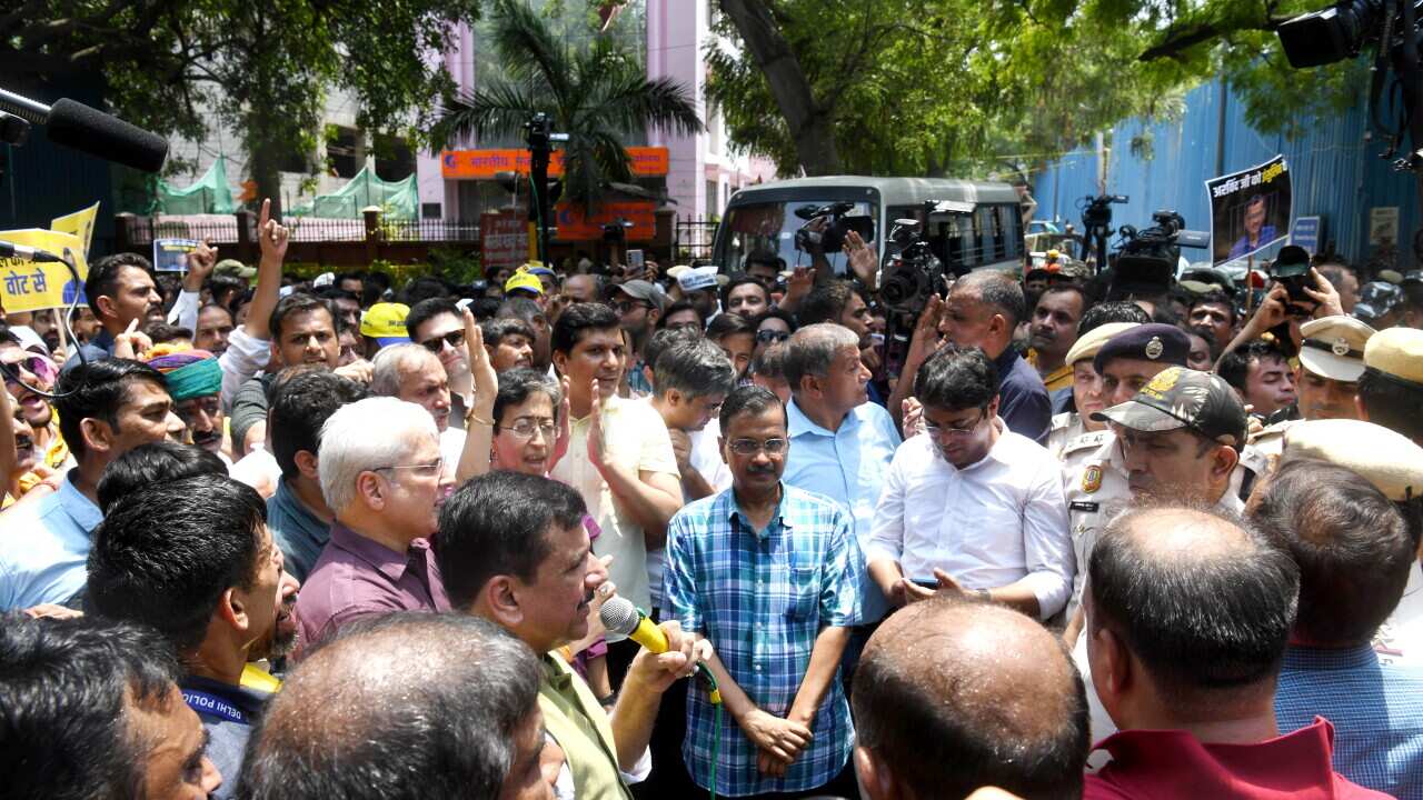 Arvind Kejriwal and AAP workers stage a protest against BJP