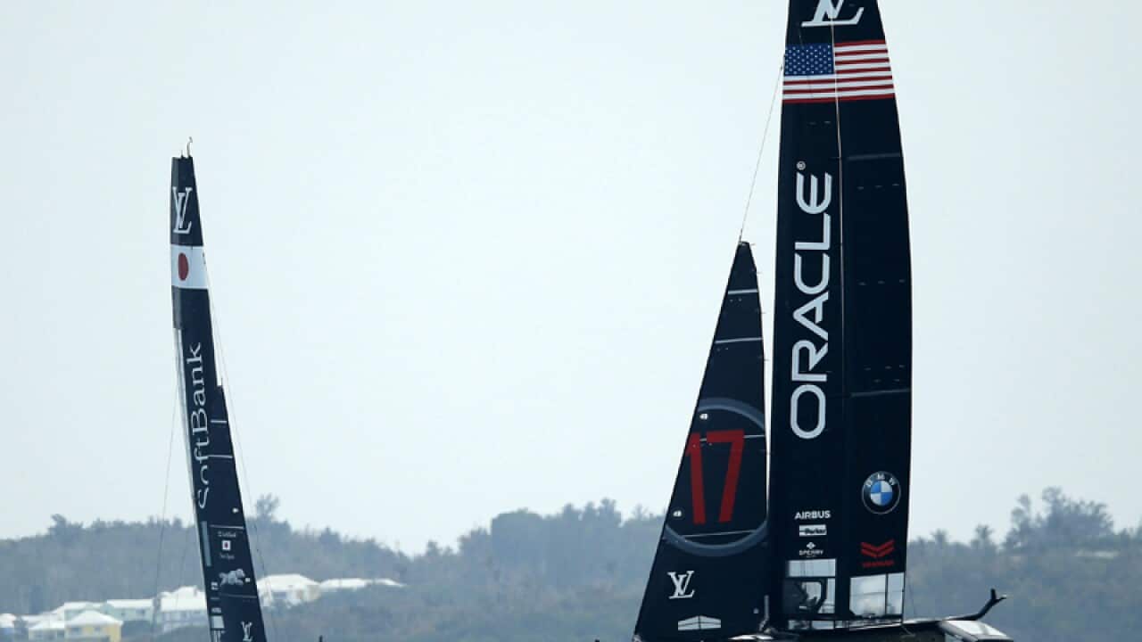 Oracle Team USA (R) competes against Softbank Team Japan