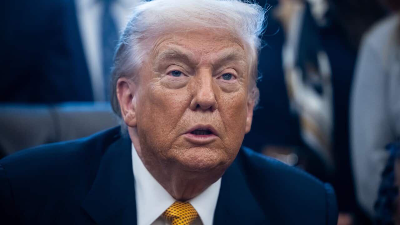 President Donald Trump takes part in a signing ceremony in the Oval Office at the White House