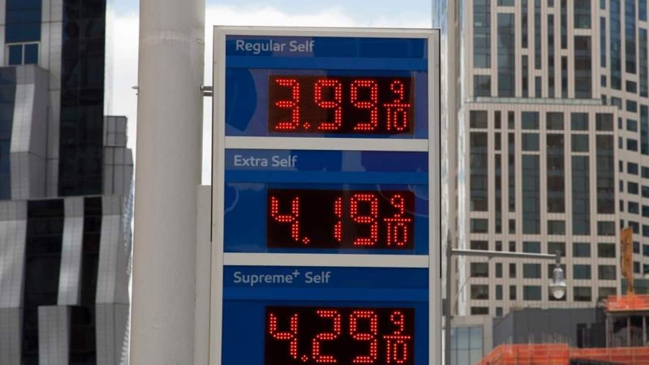 A file image of petrol prices at a station in New York