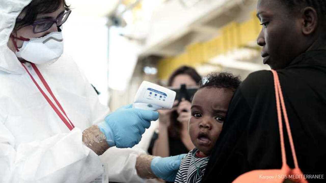 Migrants disembarking the SOS Mediterranee's Aquarius ship and MSF (Doctors Without Borders) NGOs, after its arrival at the eastern port of Valencia, Spain.