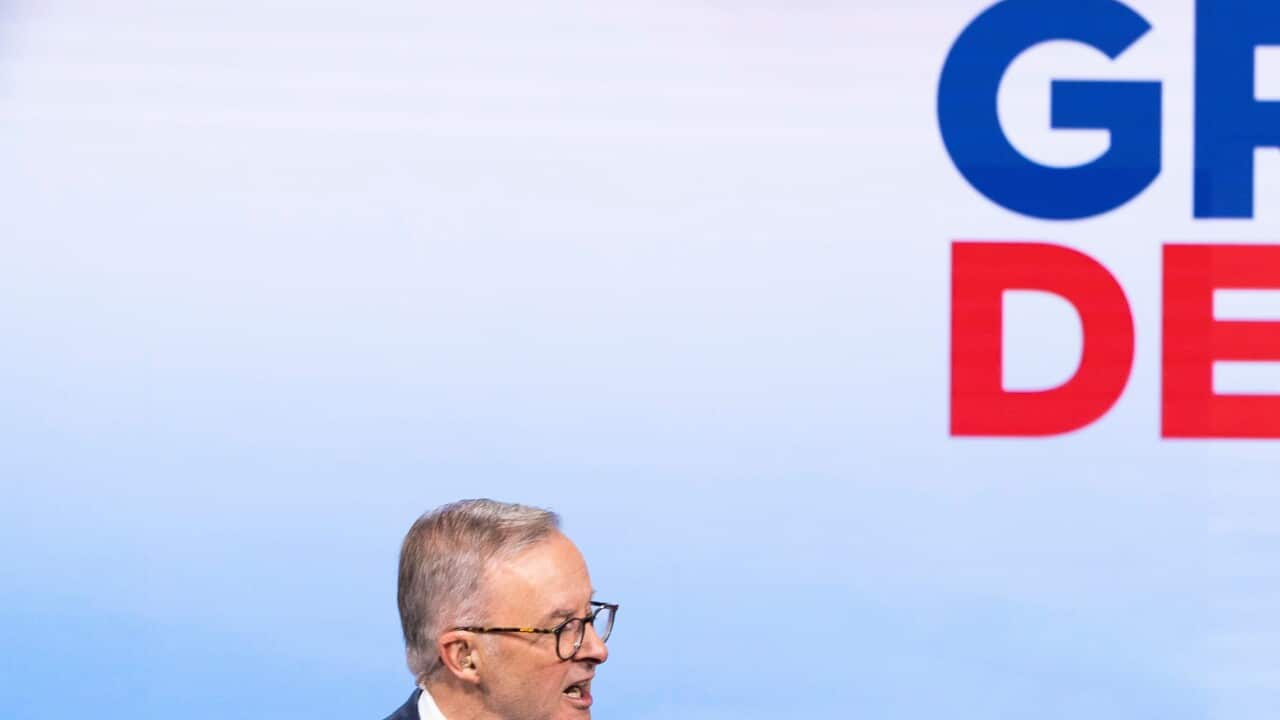 Australian Prime Minister Scott Morrison (right) and Opposition Leader Anthony Albanese during the second leaders' debate ahead of the federal election at Nine Studios in Sydney, Sunday, May 8, 2022. (AAP Image/Pool, Alex Ellinghausen) NO ARCHIVING