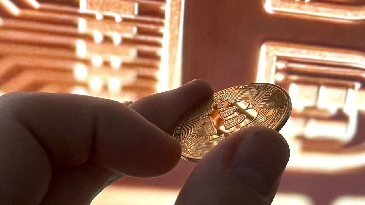 Photo by: STRF/STAR MAX/IPx 2021 2/9/21 Bitcoin surges to new highs as both retail and instutional investors look to cash in on the cryptocurrency frenzy. Earlier today, the price of Bitcoin hit an all time high of $48,000.