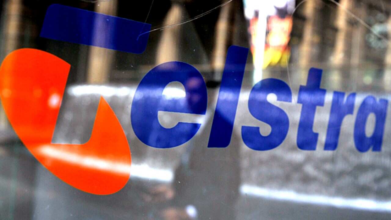 Telstra signage on a public phone booth in Martin Place