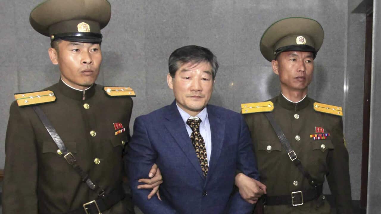 In this April 29, 2016, file photo, Kim Dong Chul, center, a US citizen detained in North Korea, was freed.
