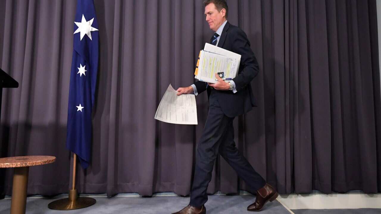 Attorney-General Christian Porter arrives to deliver the Richardson Review into Australia's intelligence and security laws at a press conference at Parliament House in Canberra, Friday, December 4, 2020. (AAP Image/Mick Tsikas)