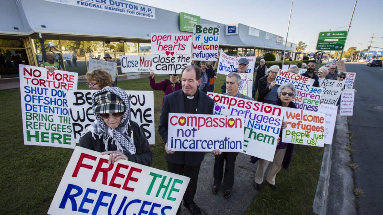 Members of the Refugee Action Collective protest outside the office of Federal Minister for Immigration and member for Dickson, Peter Dutton,