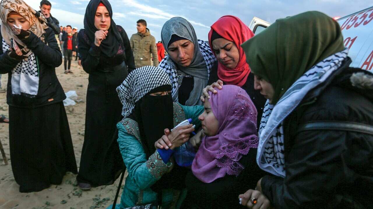 "A protester affected by gas bombs during a protest within the "Great March of Return" demonstrations in Rafah, Gaza on December 21, 2018.