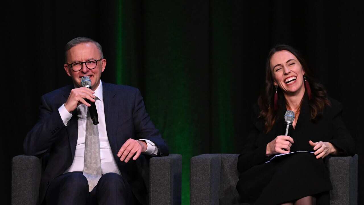 New Zealand Prime Minister Jacinda Ardern and Australian Prime Minister Anthony Albanese take part in a Q and A at the Australia-New Zealand Leadership Forum (ANZLF) Dinner in Sydney, Thursday, July 7, 2022. (AAP Image/Dean Lewins) NO ARCHIVING