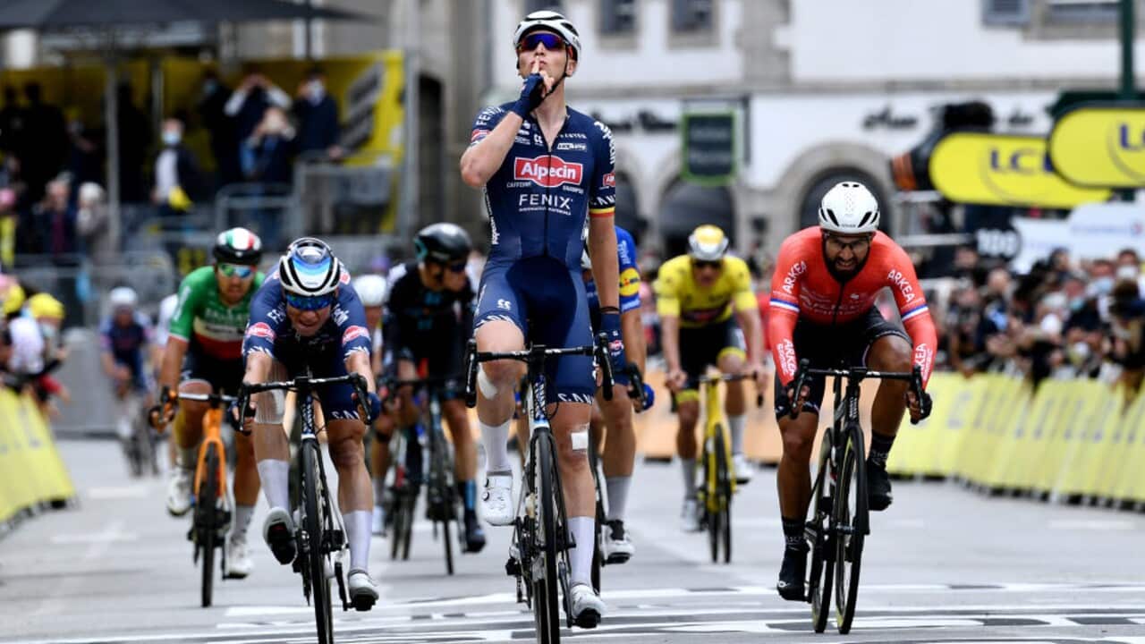 Tim Merlier celebrates his Stage 3 victory at the Tour de France