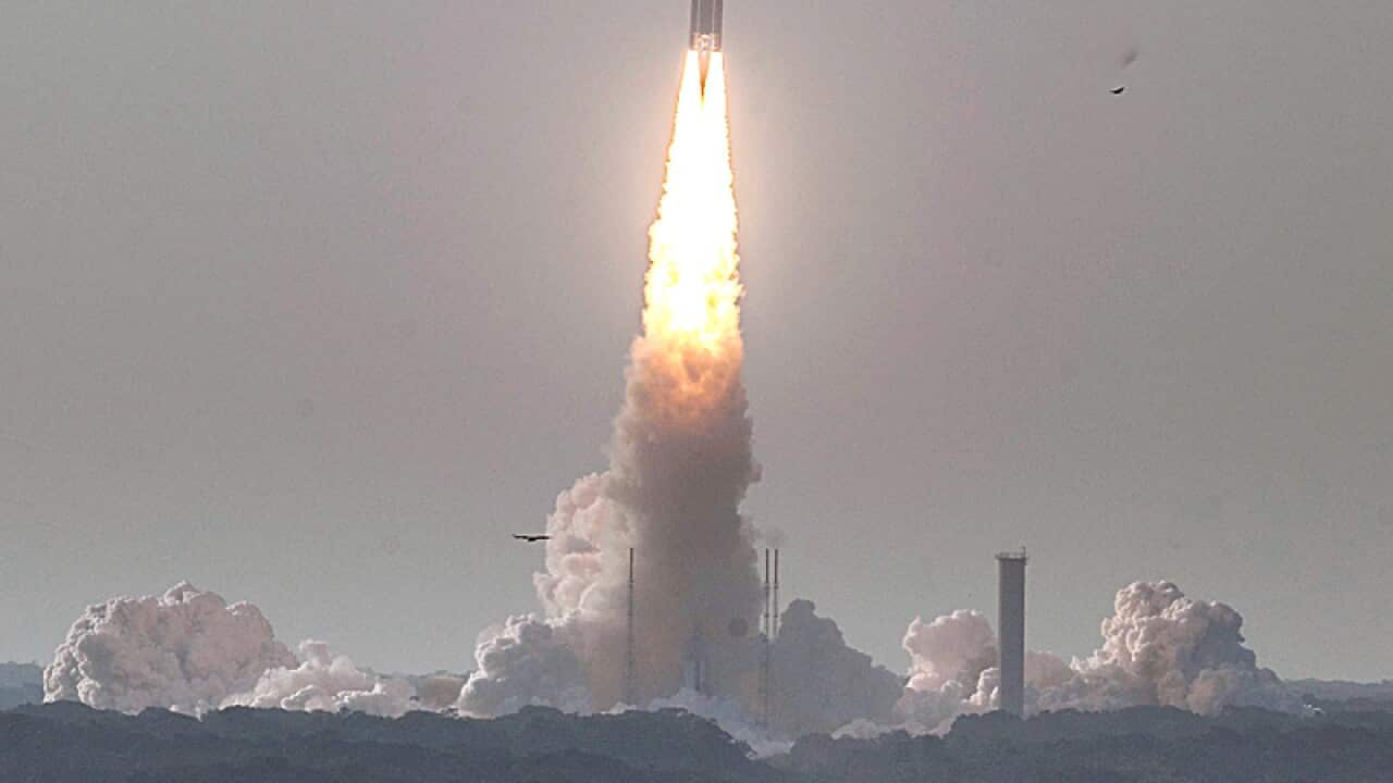 A rocket caring Sky Muster during take off in South America