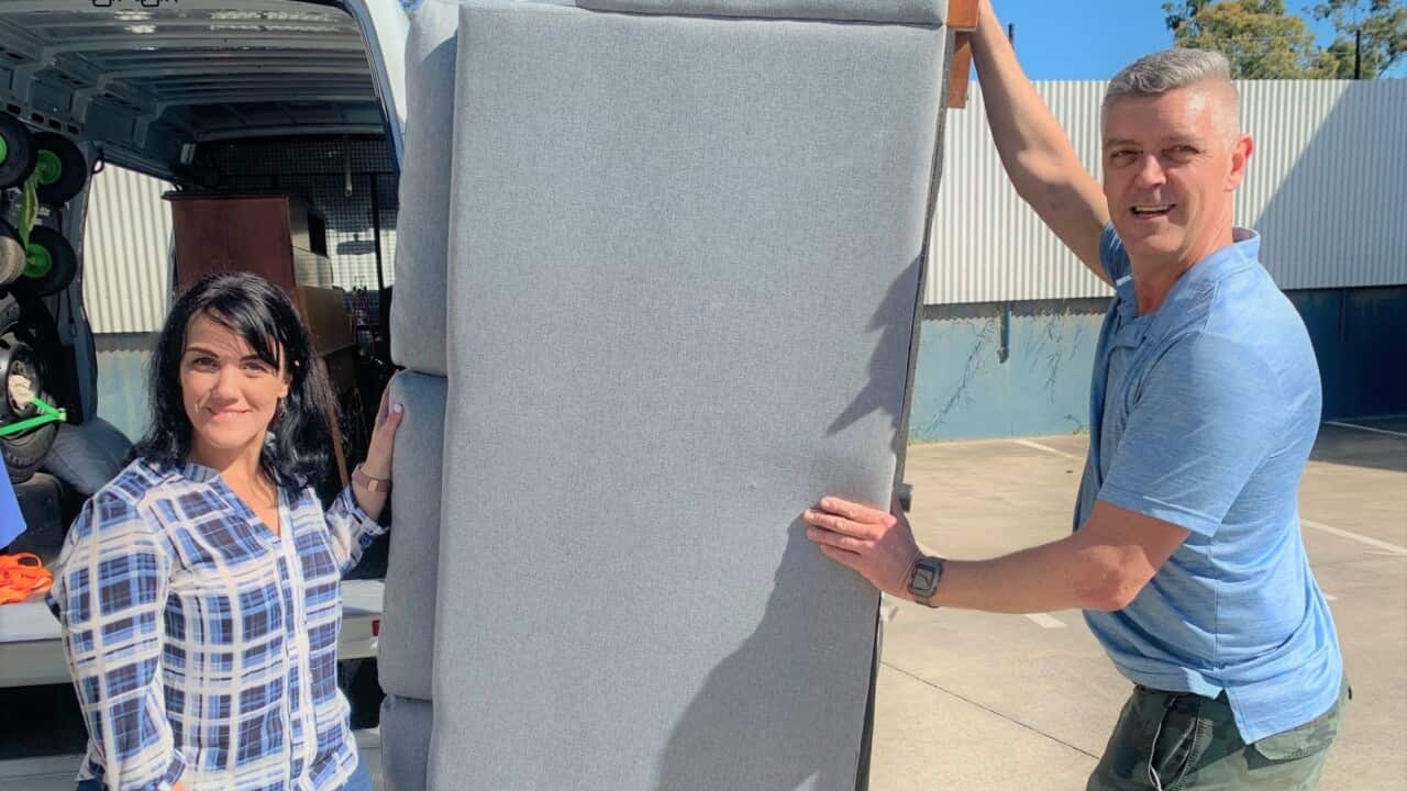 Manuela Whitford and her husband Darrell load furniture into a van