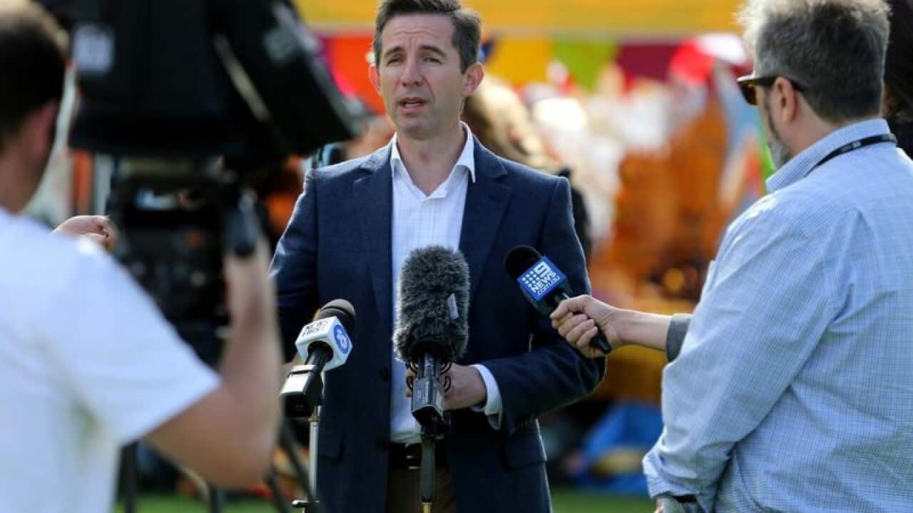 Simon Birmingham speaks at a press conference in Adelaide.