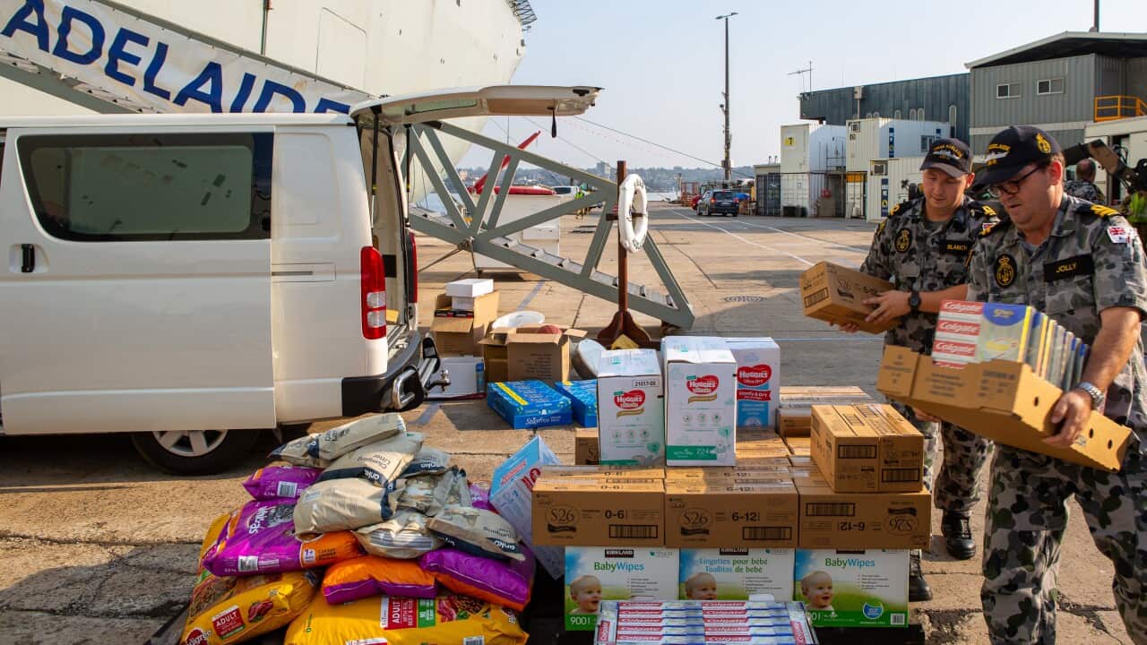 Supplies being gathered to be embarked on board HMAS Adelaide as the ship prepares to deploy as part of the Operation Bushfire Assist 2019-20.