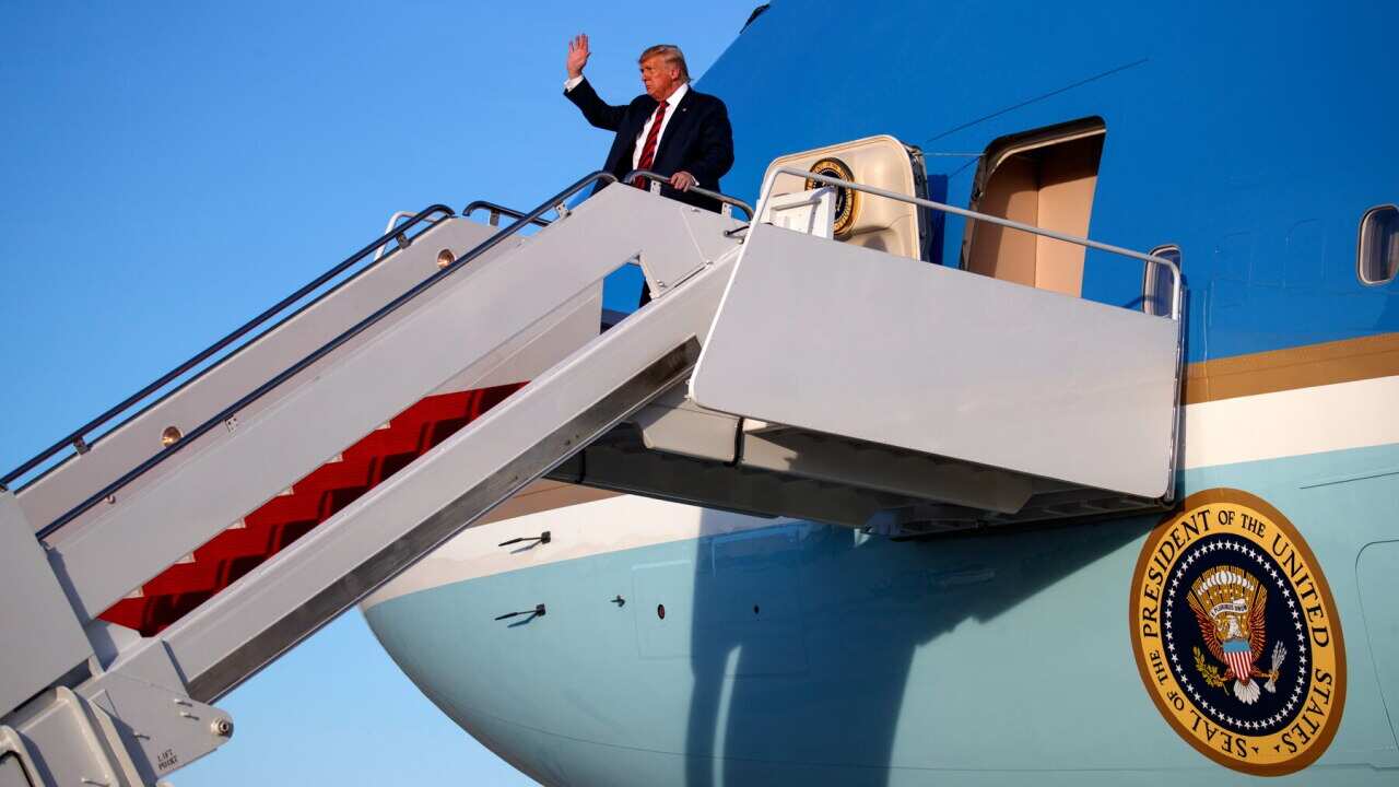 President Donald Trump leaves Air Force 1 after attending the Police Chiefs' Conference
