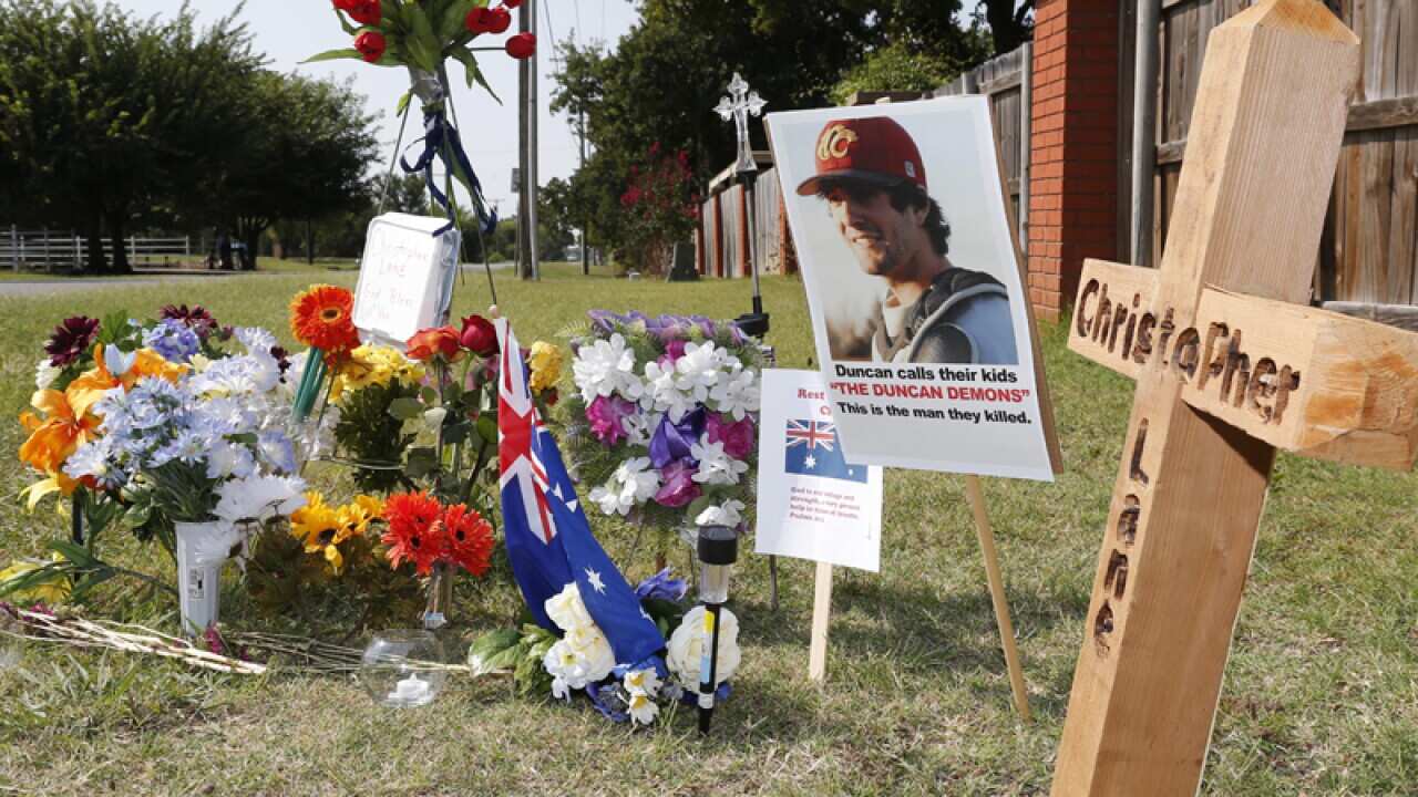 A memorial to Chris Lane along the road where he was shot and killed