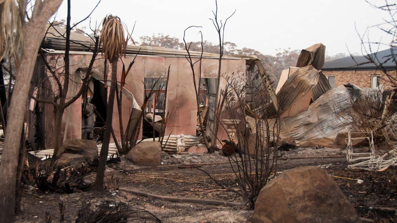 A burnt home is seen in Malua Bay, NSW in January