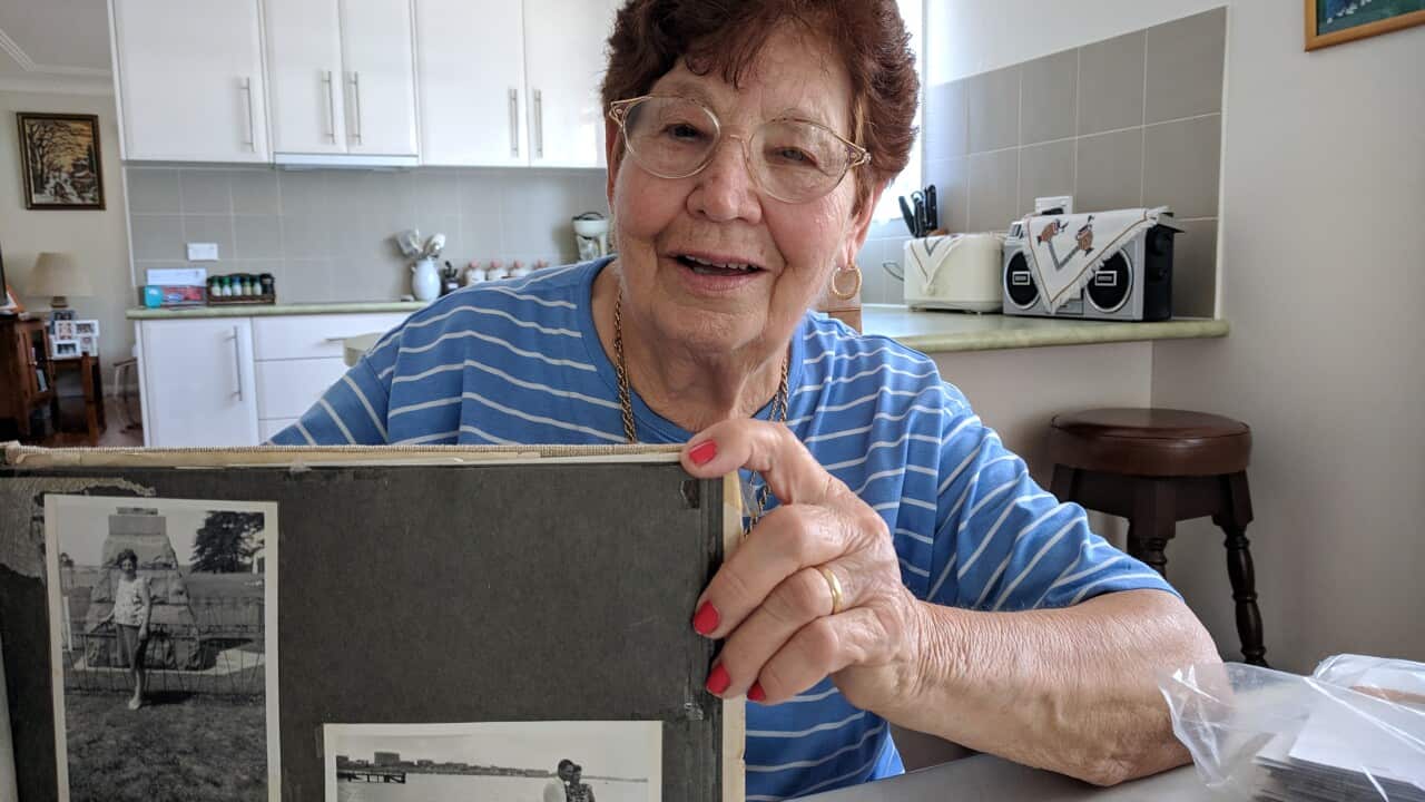 Mara Finka holding a photo of the late husband Tomislav Finka