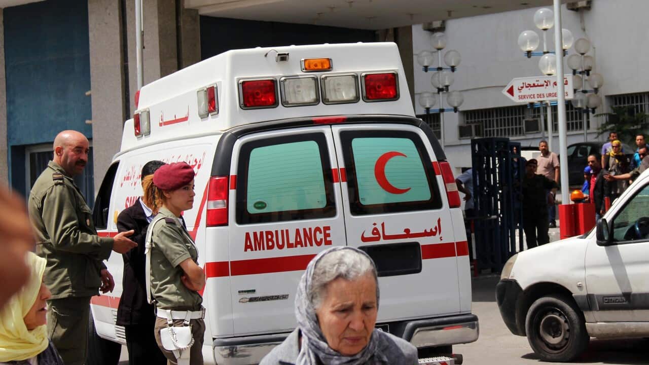 As people await news of those shot when a soldier opened fire on comrades during a flag raising ceremony at the Bouchoucha barracks killing seven and wounding a further ten (EPA/STR)