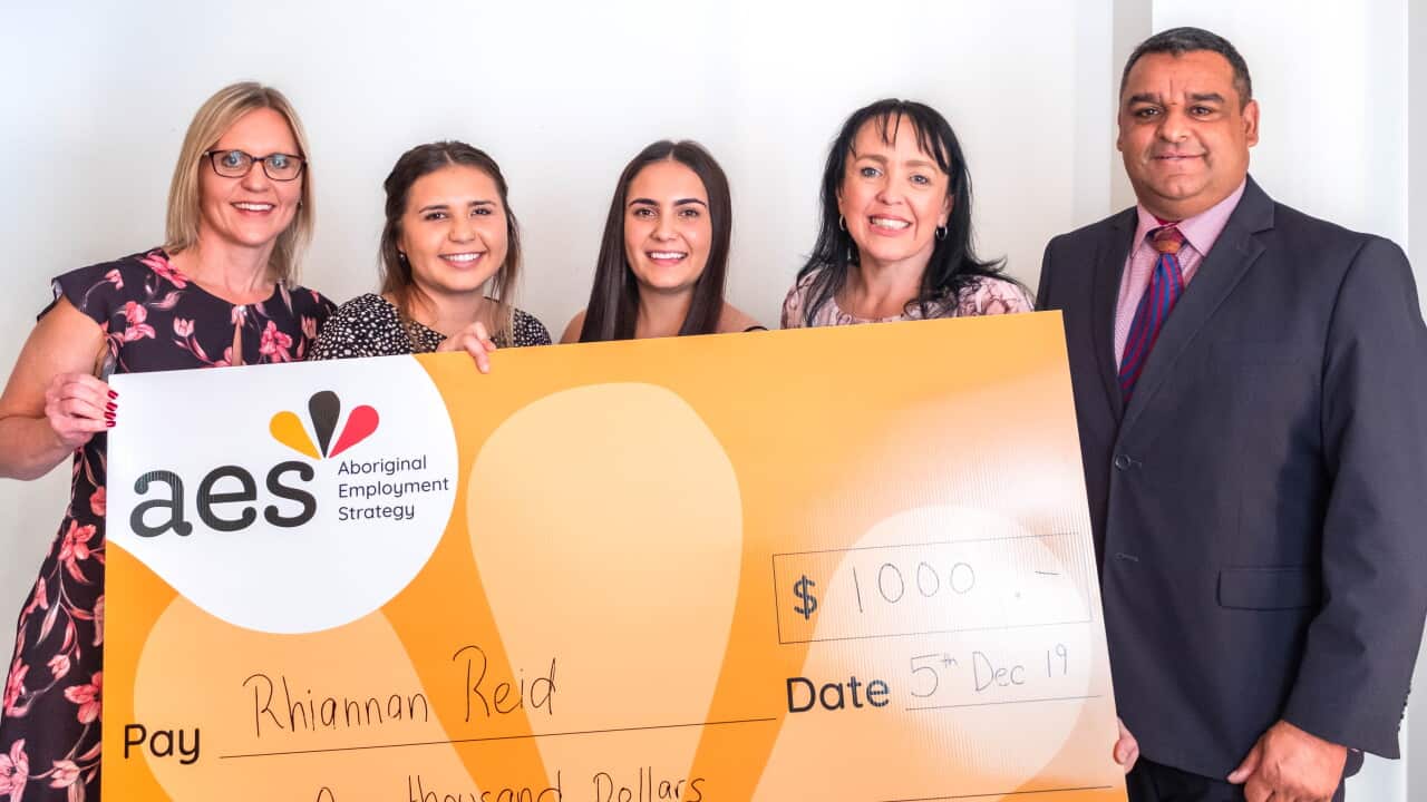 Rhiannan Reid 2019 AES Chairman’s Award winner, her team and the Director of AES.