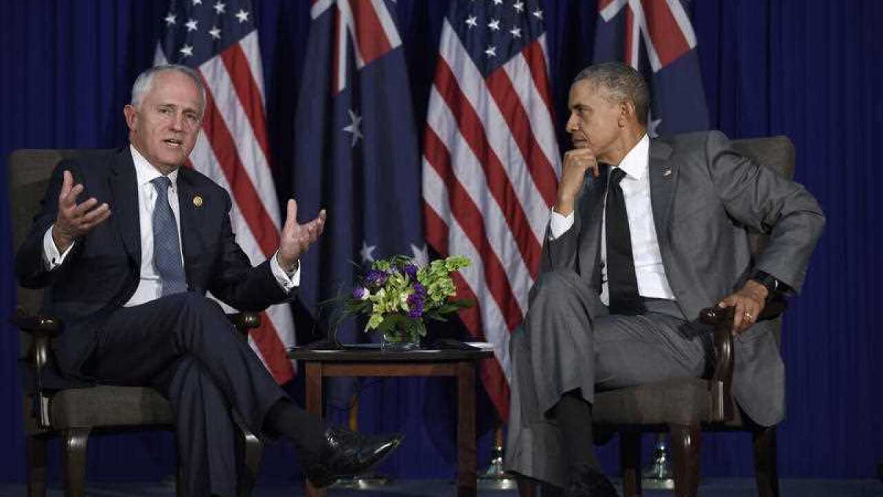 US President Barack Obama, right, listens as Australia's Prime Minister Malcolm Turnbull