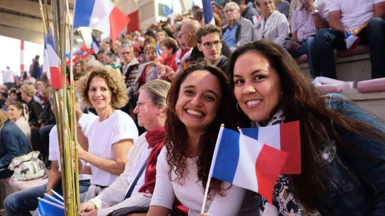 Loyalists wave French national flags for the "NO" to the independence referendum in New Caledonia.