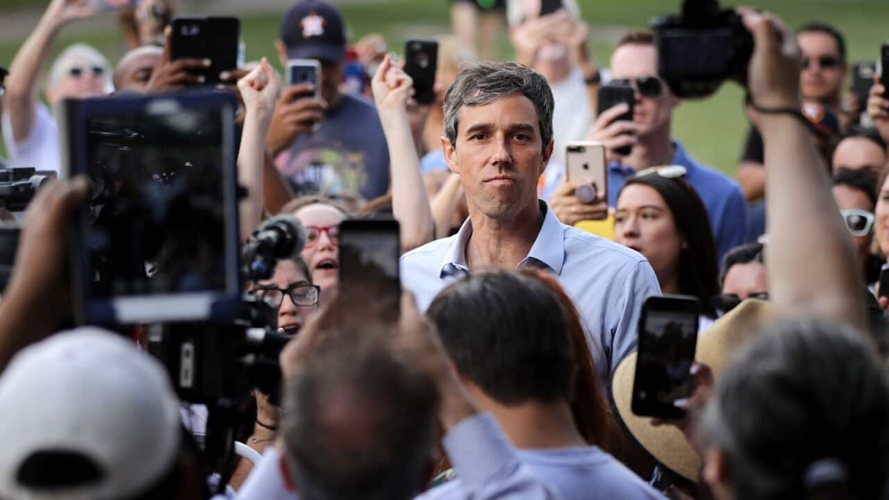 Beto O'Rourke gives a speech during a campaign stop at Moody Park.