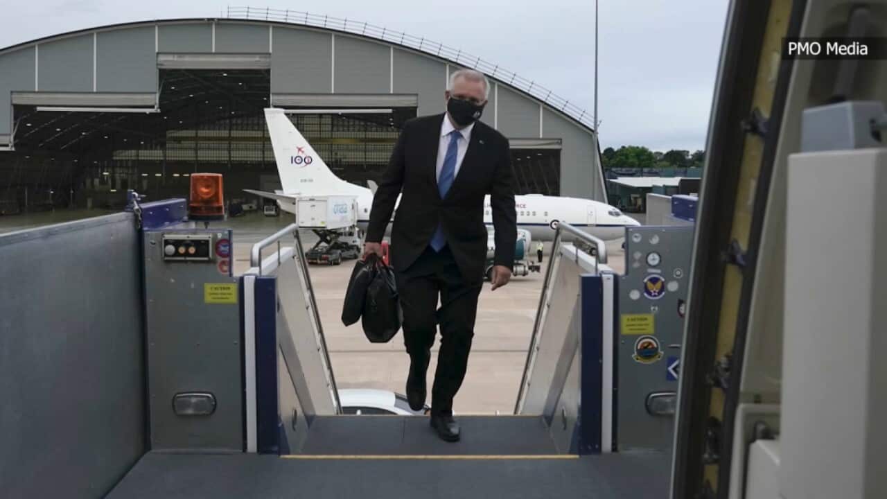 Scott Morrison boards the plane, bound for Europe